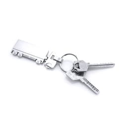 A silver trailer-shaped keyring with a keyring attachment and two keys.