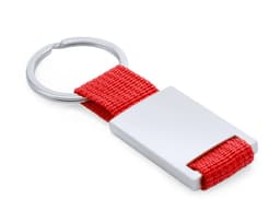 A red keyring featuring a fabric strap and a silver metallic clasp, with a branding logo on the metallic part.