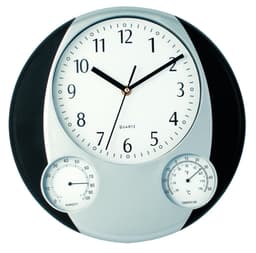 A wall clock featuring a white face with black numbers, silver accents, and dials for humidity and temperature.