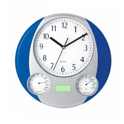 A round wall clock with a blue and silver design features large numbers, a thermometer, and a humidity gauge.