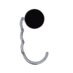 A chrome-finished foldable bag hanger with a circular black base, featuring a curved handle design.