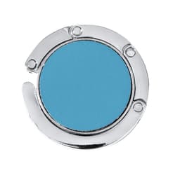 A round, foldable bag hanger in a shiny silver finish with a blue surface and a branded logo.