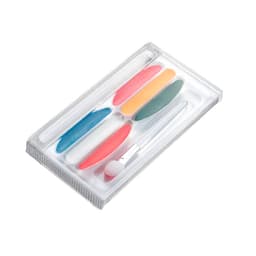 A coloured game set in a transparent case featuring blue, red, green, and yellow components along with a tool.