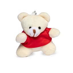 A cute, creamy teddy bear keyring wearing a red shirt, featuring a small attachment loop.