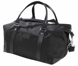 A black duffle bag with leather accents and sturdy handles, featuring a zipped closure and a detachable strap.