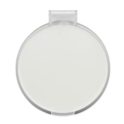 A compact mirror featuring a round design with a clear outer casing and a smooth, reflective surface.