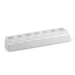 A white medication organiser with compartments labelled for each day of the week.