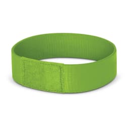 A bright green Dazzler Wrist Band made of durable material, featuring a secure hook-and-loop fastener.