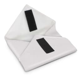 A reusable food wrap is displayed, featuring a white fabric design with black velcro closures.