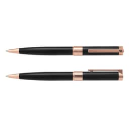 A set of black metal pens with rose gold accents, featuring a sleek design and a logo on the clip.