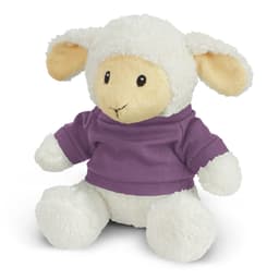 A soft lamb plush toy with cream fur and large ears, wearing a purple shirt. It has a cute, smiling face.