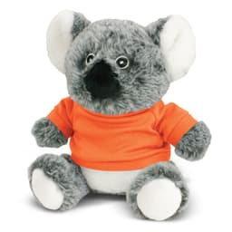 A grey koala plush toy wearing an orange shirt, featuring large eyes and soft fabric. It has a round nose and white accents.
