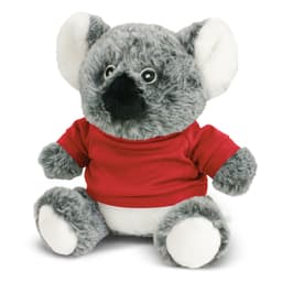 A grey koala plush toy with a black nose, wearing a red shirt, seated with its arms and legs outstretched.
