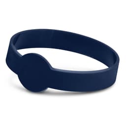 A navy silicone wristband with a debossed design and a rounded feature on the band.