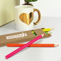 A pack of highlighter pencils in pink, orange, and yellow, alongside a decorative mug with a heart design.