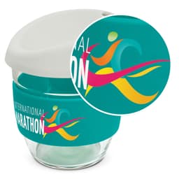 A drink bottle featuring a clear borosilicate glass body, a teal silicone sleeve, and a white lid with a logo.