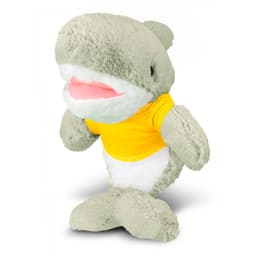 A grey shark plush toy wearing a bright yellow T-shirt, featuring a soft, friendly expression.