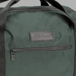 A green duffle bag with a front zip pocket and a branding logo.