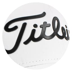 A white cap with a black logo, featuring a sleek design suitable for golf enthusiasts.