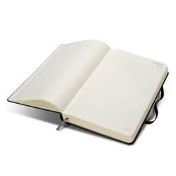 A black Moleskine 2027 Planner, featuring blank, lined pages and an elastic closure.