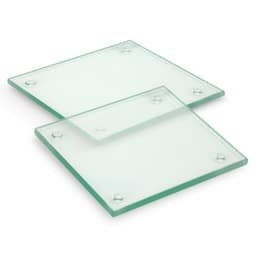 A set of two square glass coasters, featuring a clear and glossy finish with rounded corners.