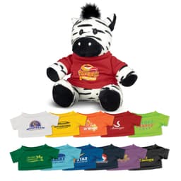 A plush zebra toy with black and white stripes, wearing a red T-shirt and surrounded by various coloured shirts.