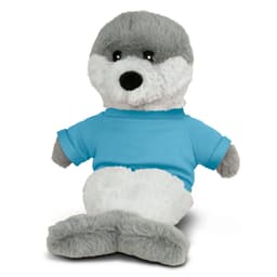 A plush toy seal in grey and white, wearing a blue shirt. It has a friendly expression and soft texture.