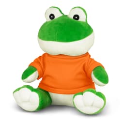 A green frog plush toy wearing an orange shirt, featuring large eyes and a friendly smile.