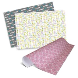 Personalised gift wrapping paper in pink and green patterns, featuring various decorative designs and a logo.