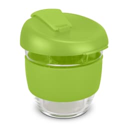 A drink bottle featuring a green silicone lid and sleeve, made of clear borosilicate glass, with a sleek design.