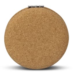 A round compact mirror with a natural cork exterior and a silver clasp.