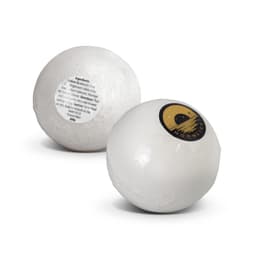 A white bath bomb with a logo featuring a crescent moon, displaying a label with ingredients.
