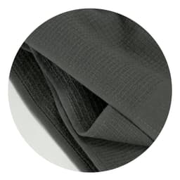 A dark grey waffle towel with a textured surface, featuring a folded design. It has a branding logo.