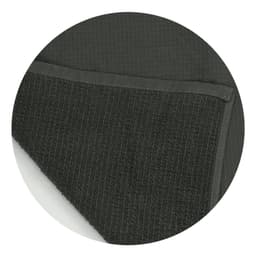 A dark green waffle towel with a textured surface and a smooth border, featuring a branding logo.