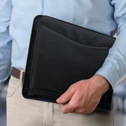 A black portfolio held by a person in a light blue shirt, designed for office and business use.