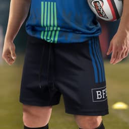 Custom men's rugby shorts in black, featuring blue stripes and a logo, designed for sports uniforms.