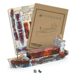 A wooden model of a cargo ship in red and brown, displayed with its cardboard packaging. Includes a logo.