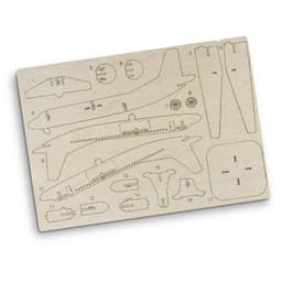 A wooden model kit of a jet plane featuring various parts arranged on a light wood board, including wings and fuselage sections.