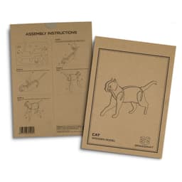 A brown cardboard sheet featuring assembly instructions for a wooden cat model, with line drawings illustrating the steps.