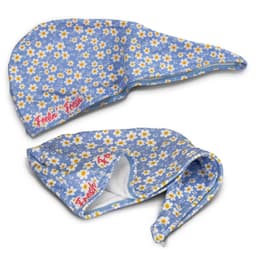 A blue floral hair towel with a pointed hood and a logo, featuring white daisies and yellow accents.