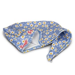 A floral blue hair towel with a white inner lining and a logo. Features a daisy pattern throughout.