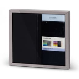 A Moleskine bundle featuring a black sketchbook and a set of 12 watercolour pencils, presented in a sleek frame.
