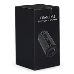 A black box featuring a Bluetooth speaker design with controls and a logo on the front.