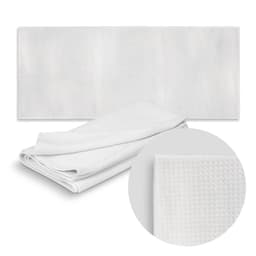 A white sand-free towel displayed flat with a close-up of its textured fabric, featuring a logo.