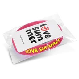 A pink silicone wristband in clear packaging with a logo.