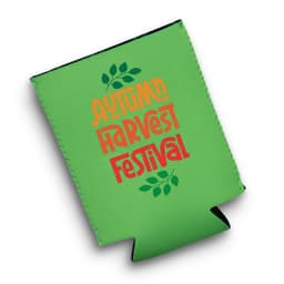 A bright green reversible stubby cooler featuring a festive design with leaves. It has a logo or branding detail.