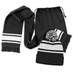 A black scarf with white stripes and a matching black beanie with a pom pom, both in a drawstring bag.