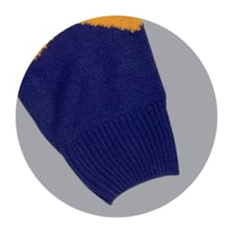 A knitted jumper featuring a navy blue body with yellow design elements on the sleeves and a ribbed cuff.