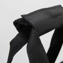 A black strap featuring durable fabric, designed for carrying or securing items.