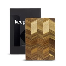 A wooden chopping board with a chevron pattern, packaged in a branded box.